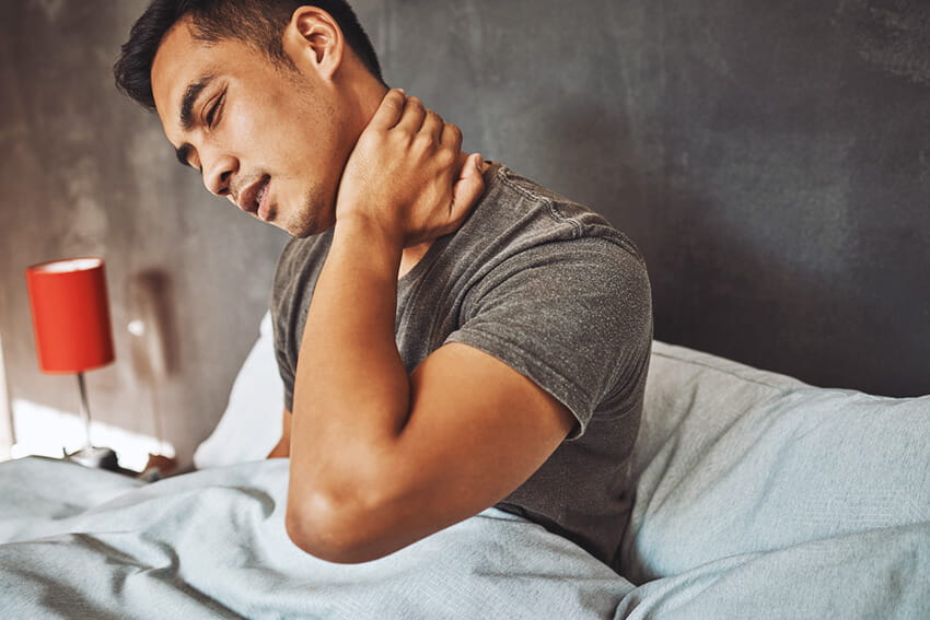 The 2 neck pain symptoms you need to get treated for right away