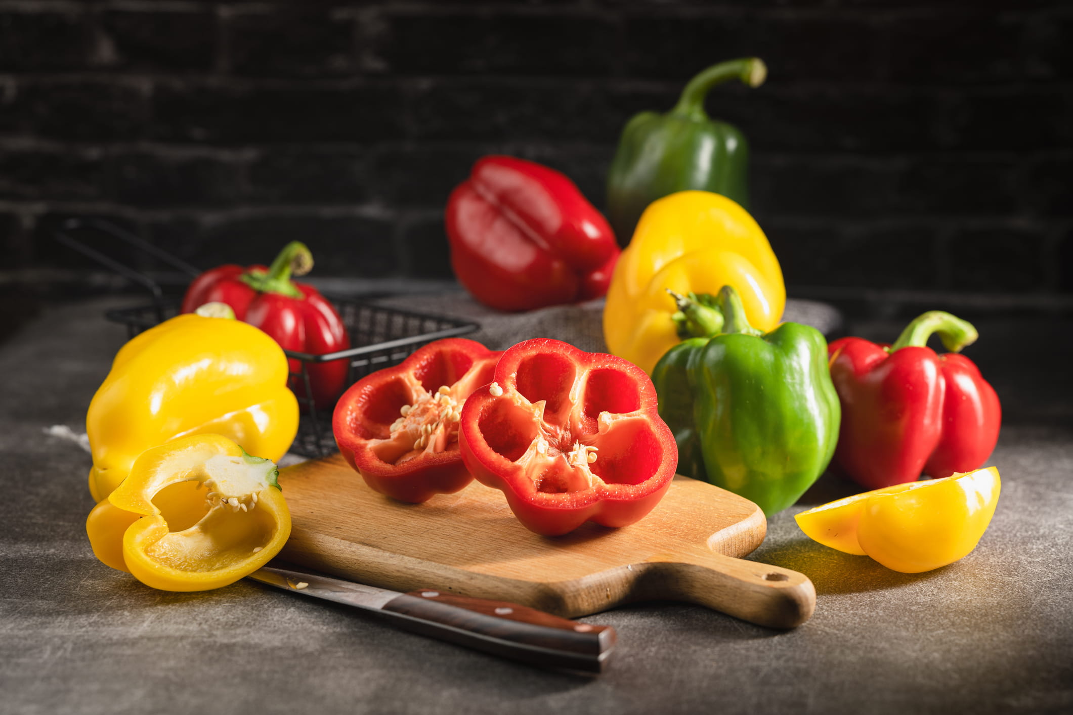Bell peppers on a cutting board.